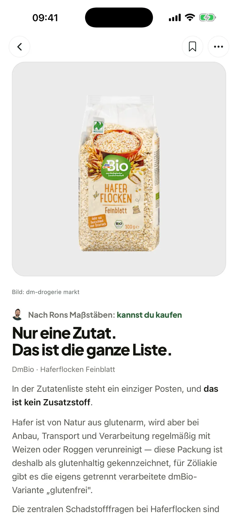 Frag Ron zeigt die Produktseite von dmBio Haferflocken: Ron sagt „kannst du kaufen“, nur eine Zutat, das ist die ganze Liste.